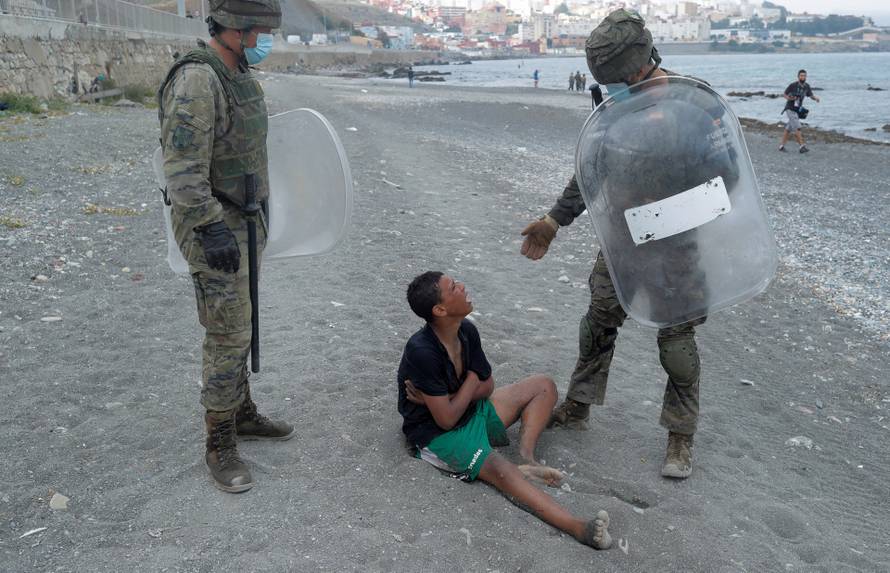 Thousands of migrants cross the Spanish-Moroccan border