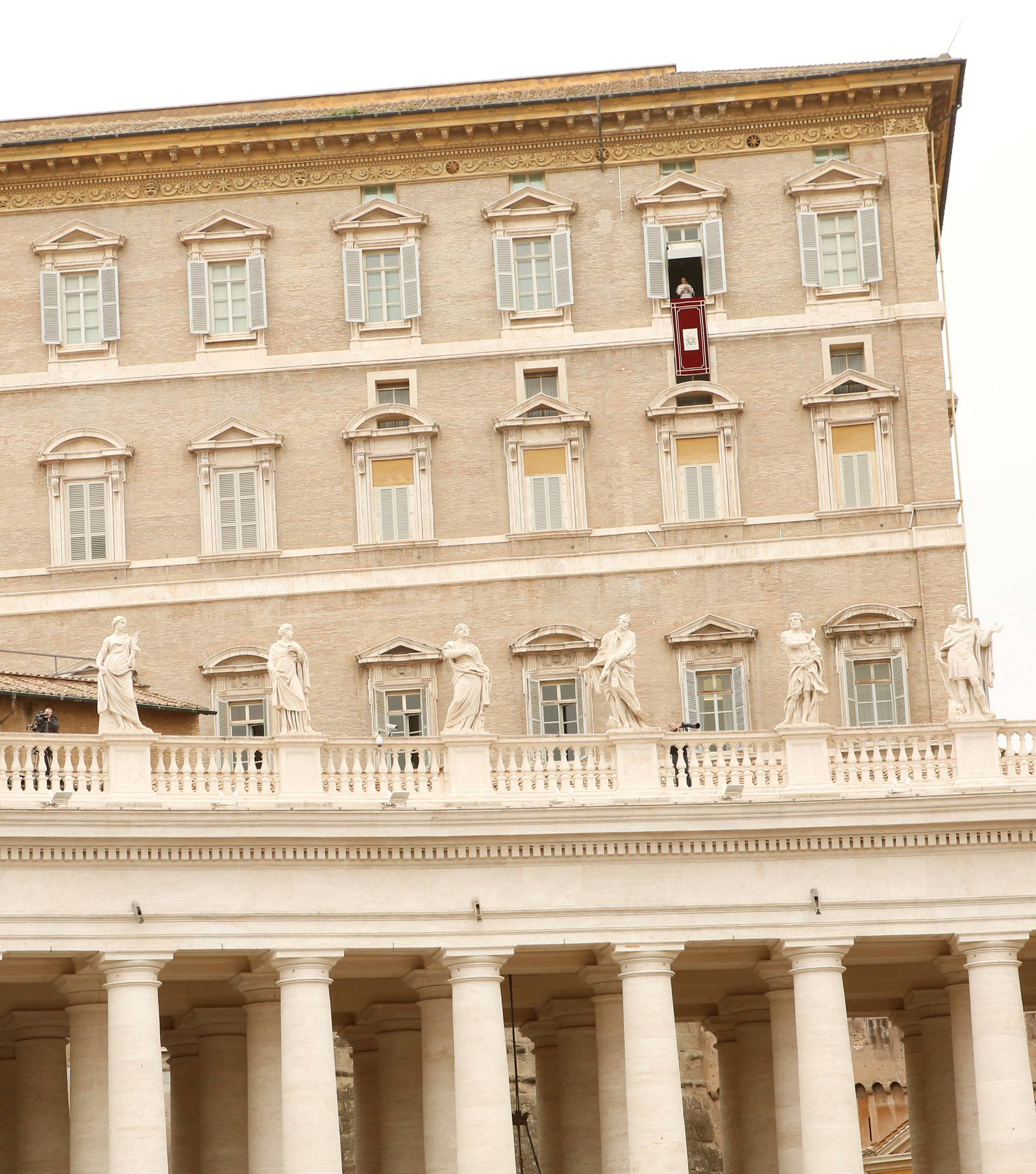 Pope Francis leads the Angelus prayer in Saint Peter's Square at the Vatican