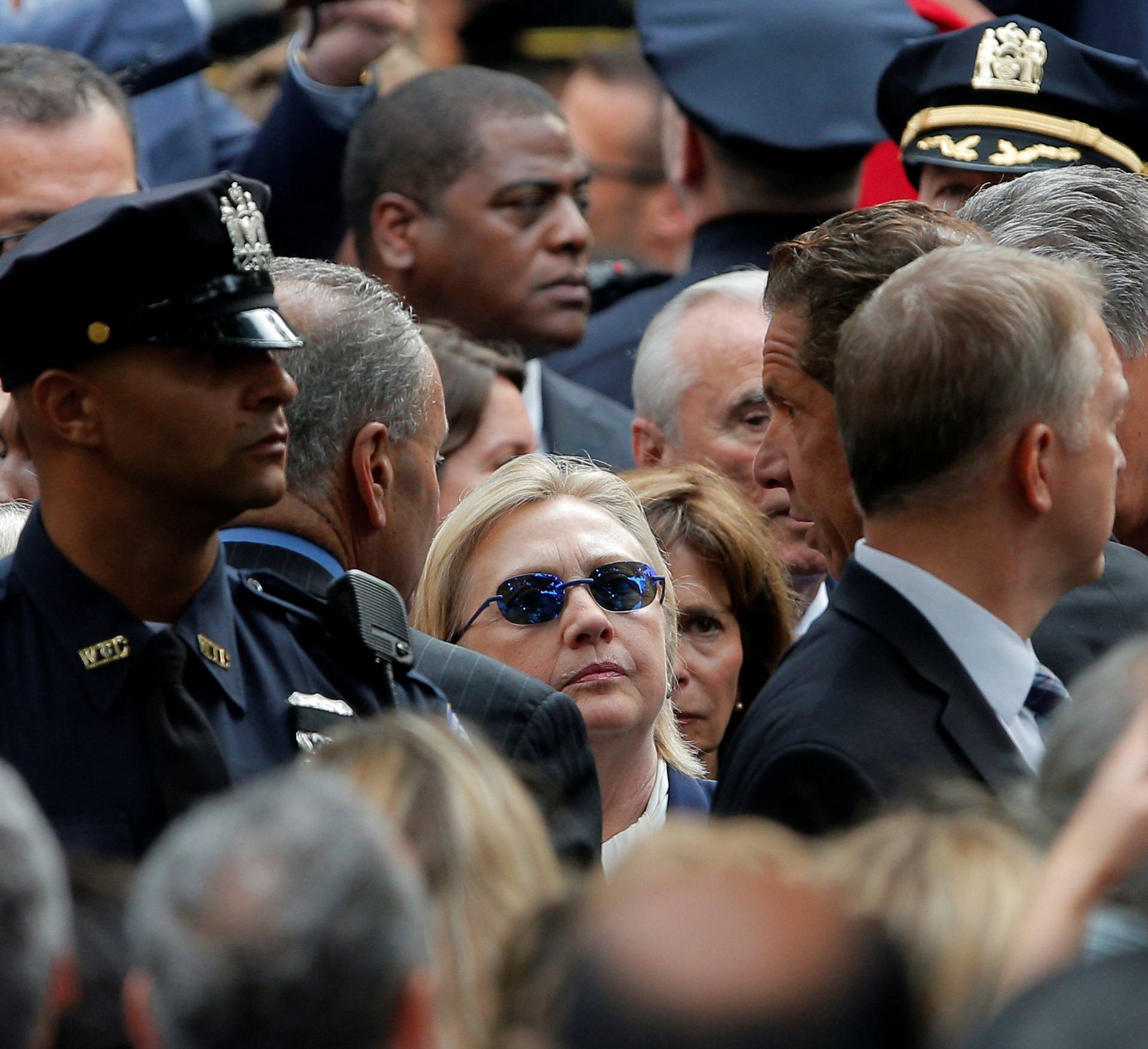 U.S. Democratic presidential candidate Hillary Clinton attends ceremonies to mark the 15th anniversary of the September 11 attacks at the National 9/11 Memorial in New York
