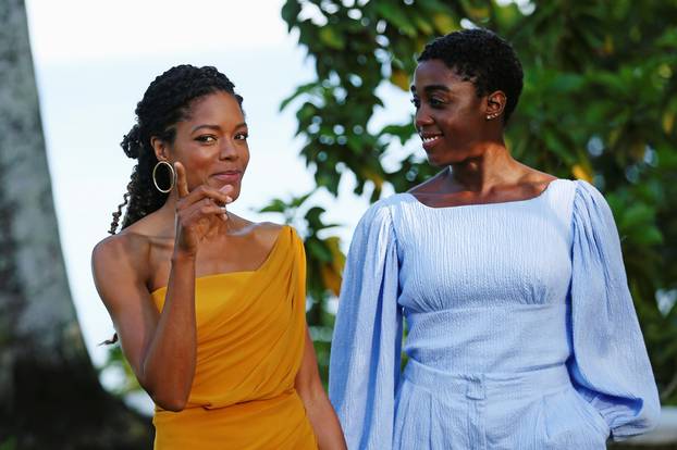 Actors Naomie Harris and Lashana Lynch pose for a picture during a photocall for the British spy franchise