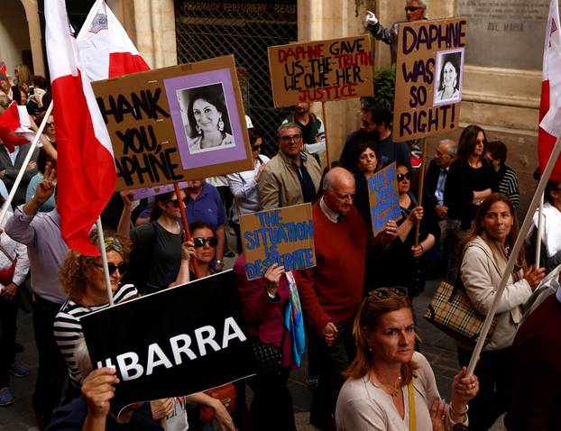 Family members of assassinated anti-corruption journalist Daphne Caruana Galizia take part in a protest against government corruption revealed by the Daphne Project, in Valletta