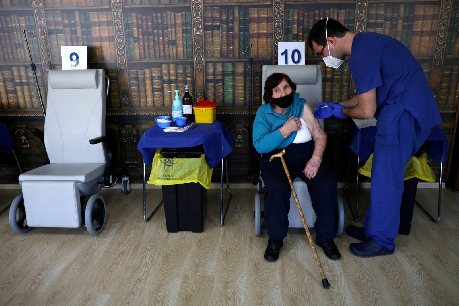 FILE PHOTO: People receive coronavirus disease (COVID-19) vaccine at the Military Medical Academy in Sofia