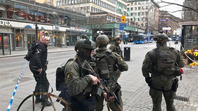 Sweden's police officers guard in the central Stockholm