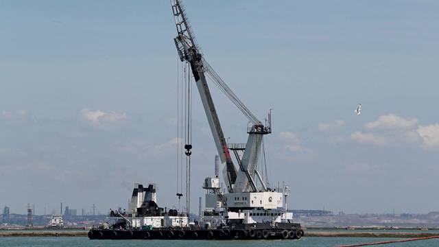 A floating crane is seen at the Port of Mariupol