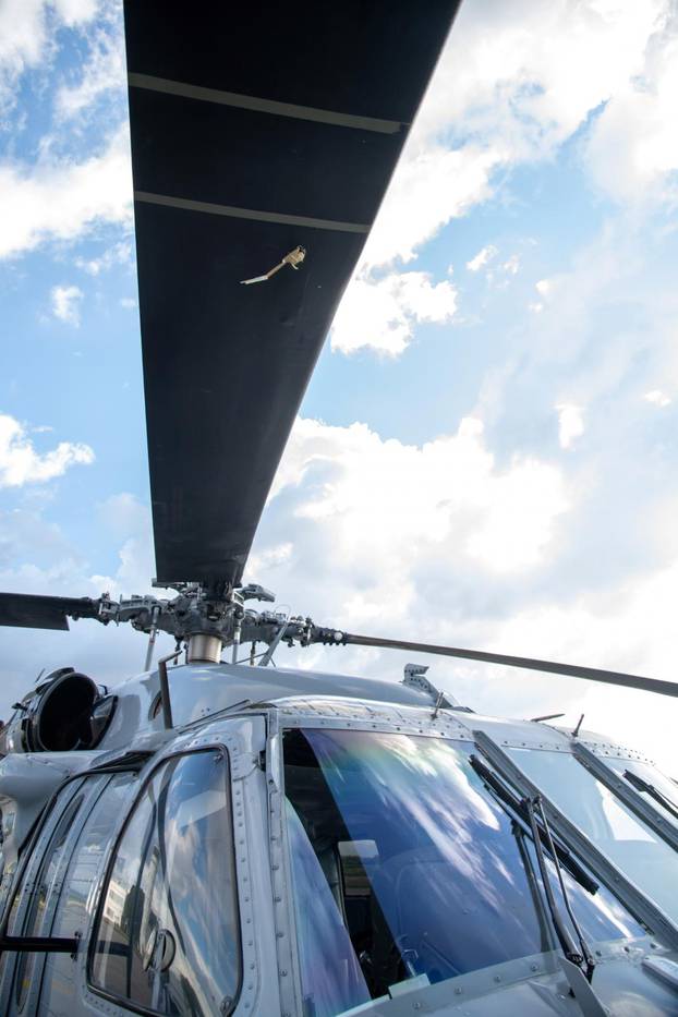 The mark of a projectile impact is seen on the propeller of a helicopter where Colombian President Ivan Duque was traveling, after, according to the authorities, suffered an attack during an overflight in Cucuta