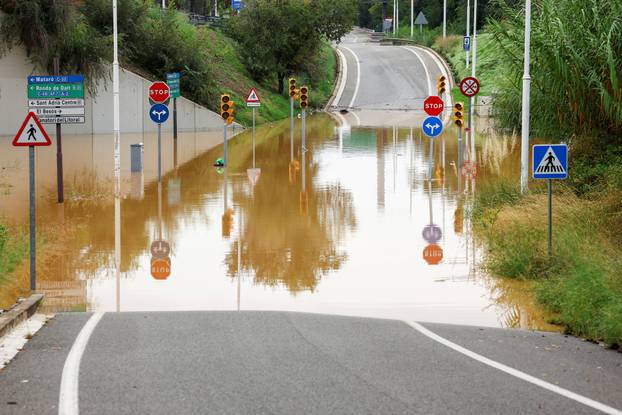 A flooded section of a road near Barcelona amid AEMET red alert for Catalonia