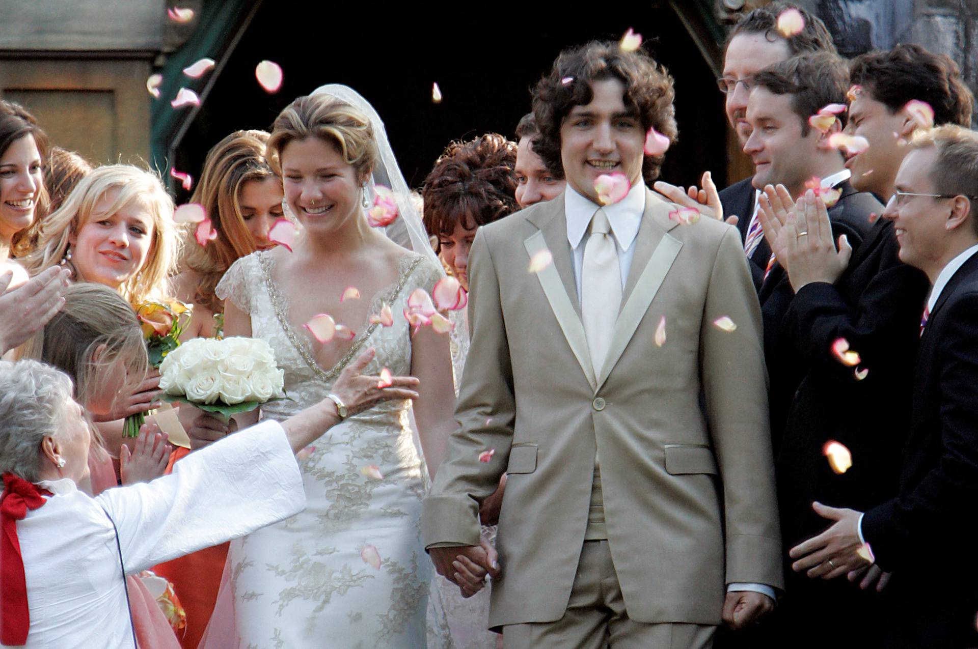 FILE PHOTO: Justin Trudeau and new bride Sophie Gregoire leave church following wedding.
