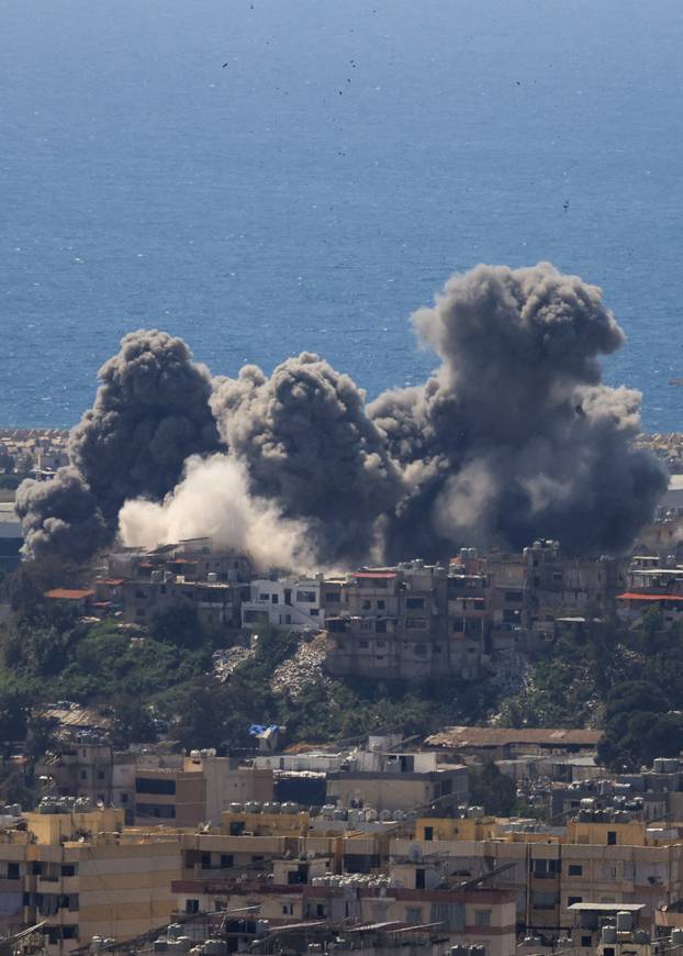 Smoke rises following an Israeli strike on the southern suburbs of Beirut