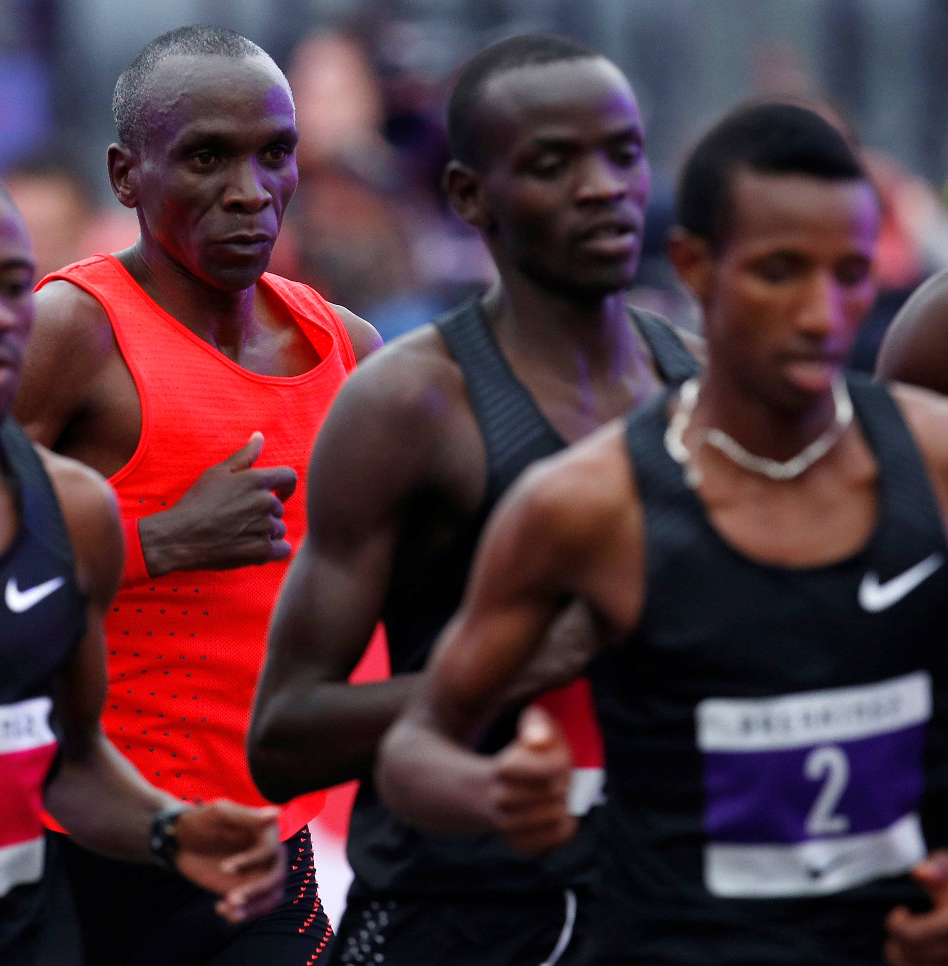 Kipchoge runs behind pace-makers during an attempt to break the two-hour marathon barrier at the Monza circuit.