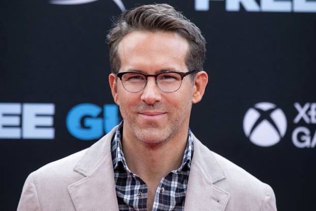 FILE PHOTO: Actor Ryan Reynolds poses at the premiere for the film "Free Guy" in New York