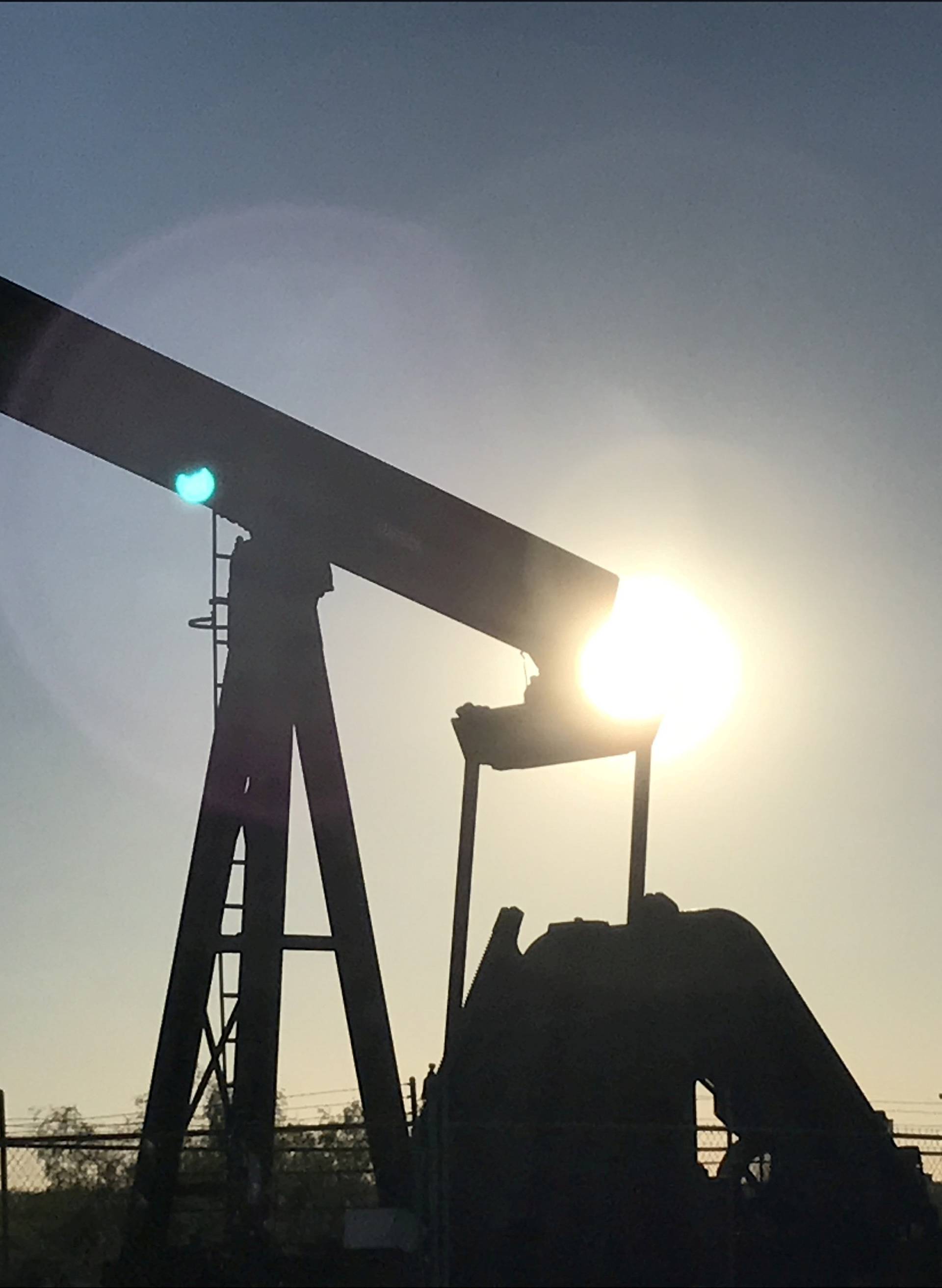 FILE PHOTO: An oil pump is seen operating in the Permian Basin near Midland