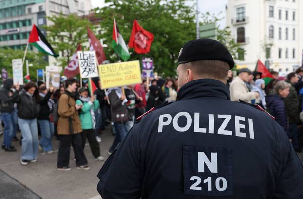 People attend a protest against Israel's participation in the Eurovision Song Contest, in Vienna