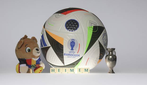 EM Euro 2024 adidas ball game ball of the European Championship in Germany with the name Fussballliebe with EM trophy and mascot Albart and Scrabble letters home EM studio symbol image background