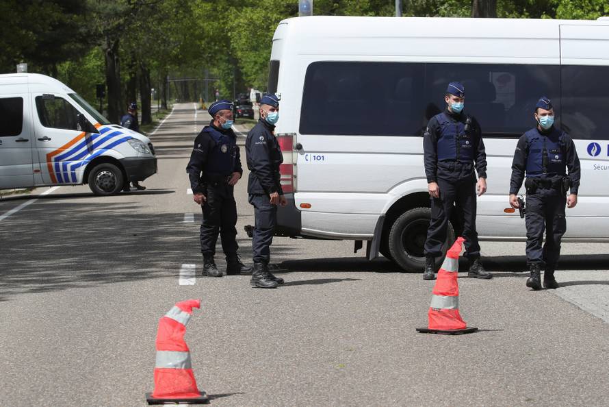 Manhunt for a Belgian soldier who threatened a virologist, in Maasmechelen