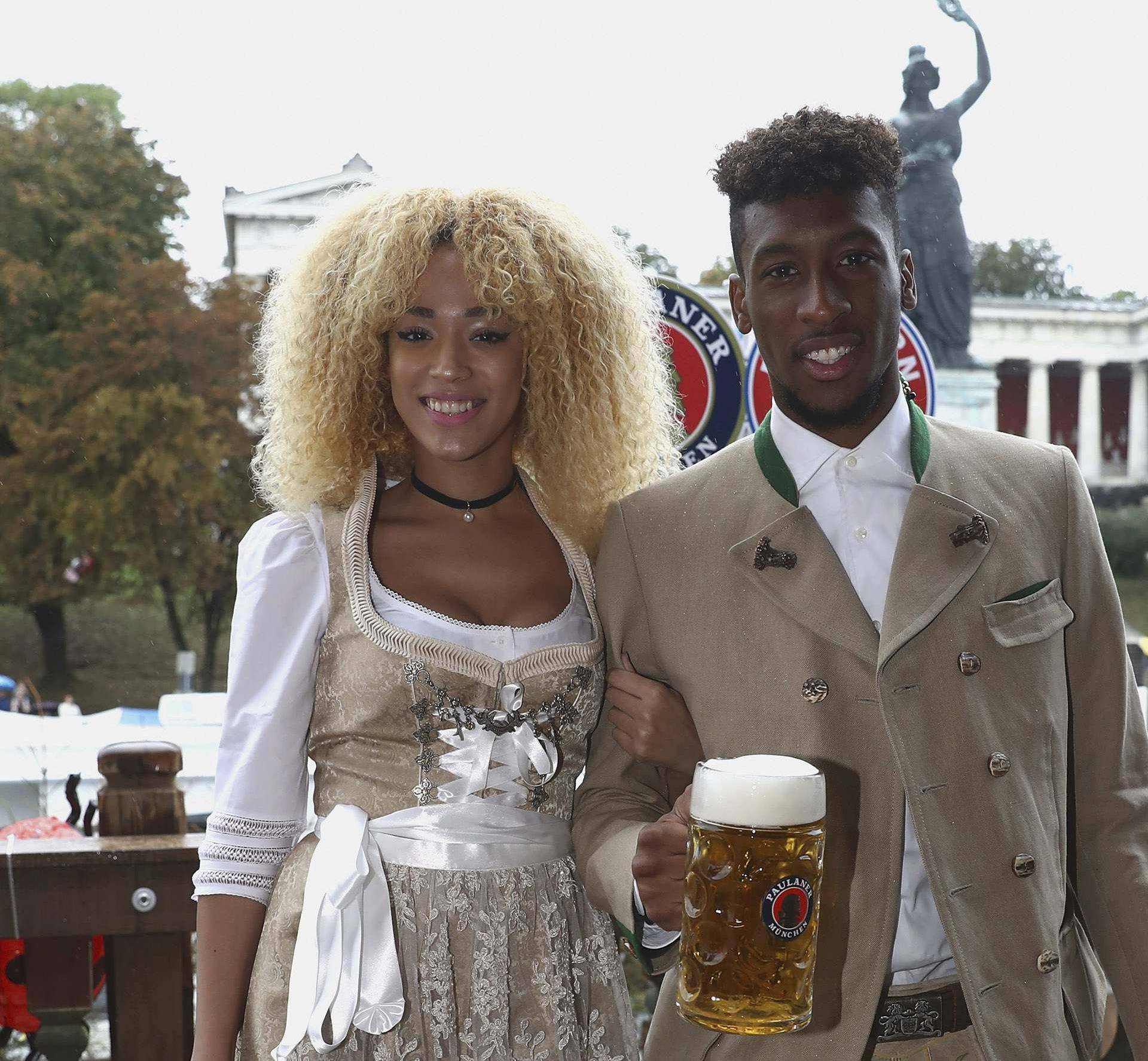 Coman of FC Bayern Munich and Sephora pose during their visit at the Oktoberfest in Munich
