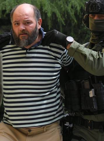 Sibenik, 19.05.2026 - Policija odvodi Kristijana Aleksica na saslusanje u Drzavno odvjetnistvo