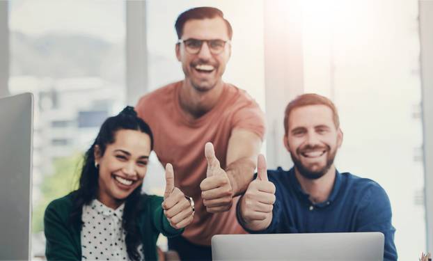 Portrait, teamwork and business people with thumbs up, laptop and support with agreement. Face, group and employees with computer, hand gesture and cooperation with partnership and positive energy