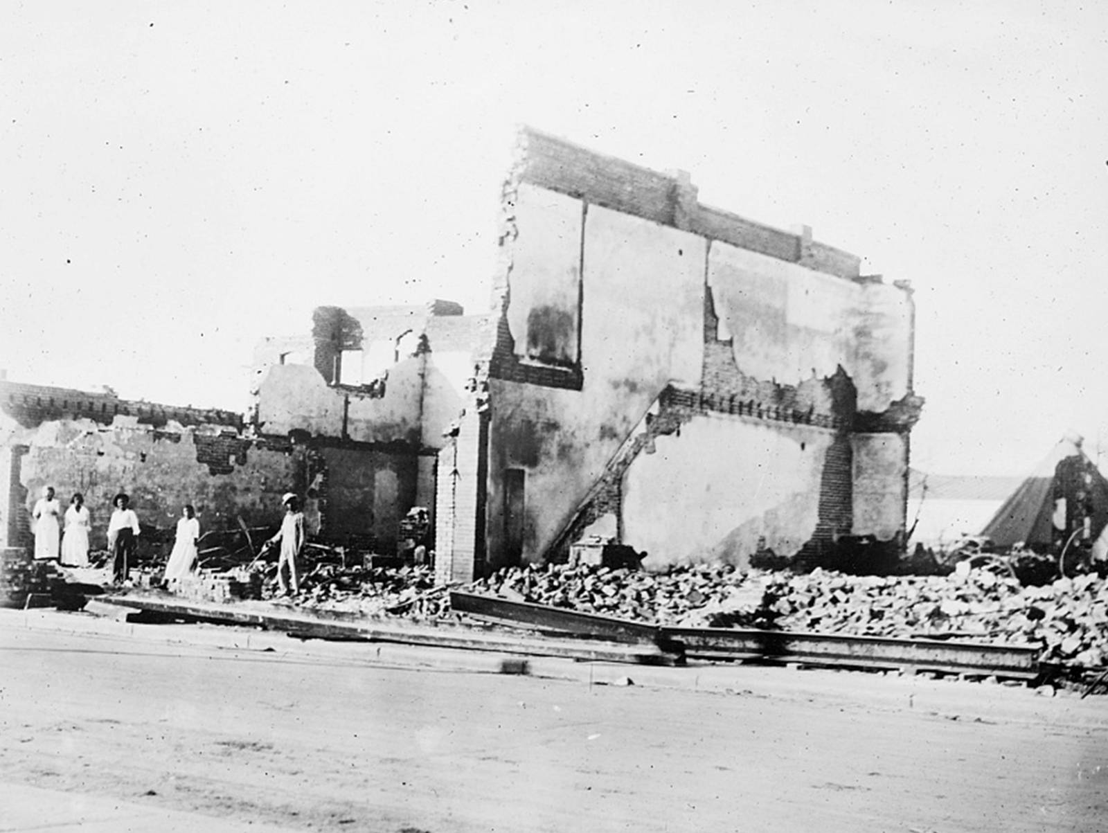 The Woods building in the Greenwood neighborhood after a mob passed during the race massacre in Tulsa