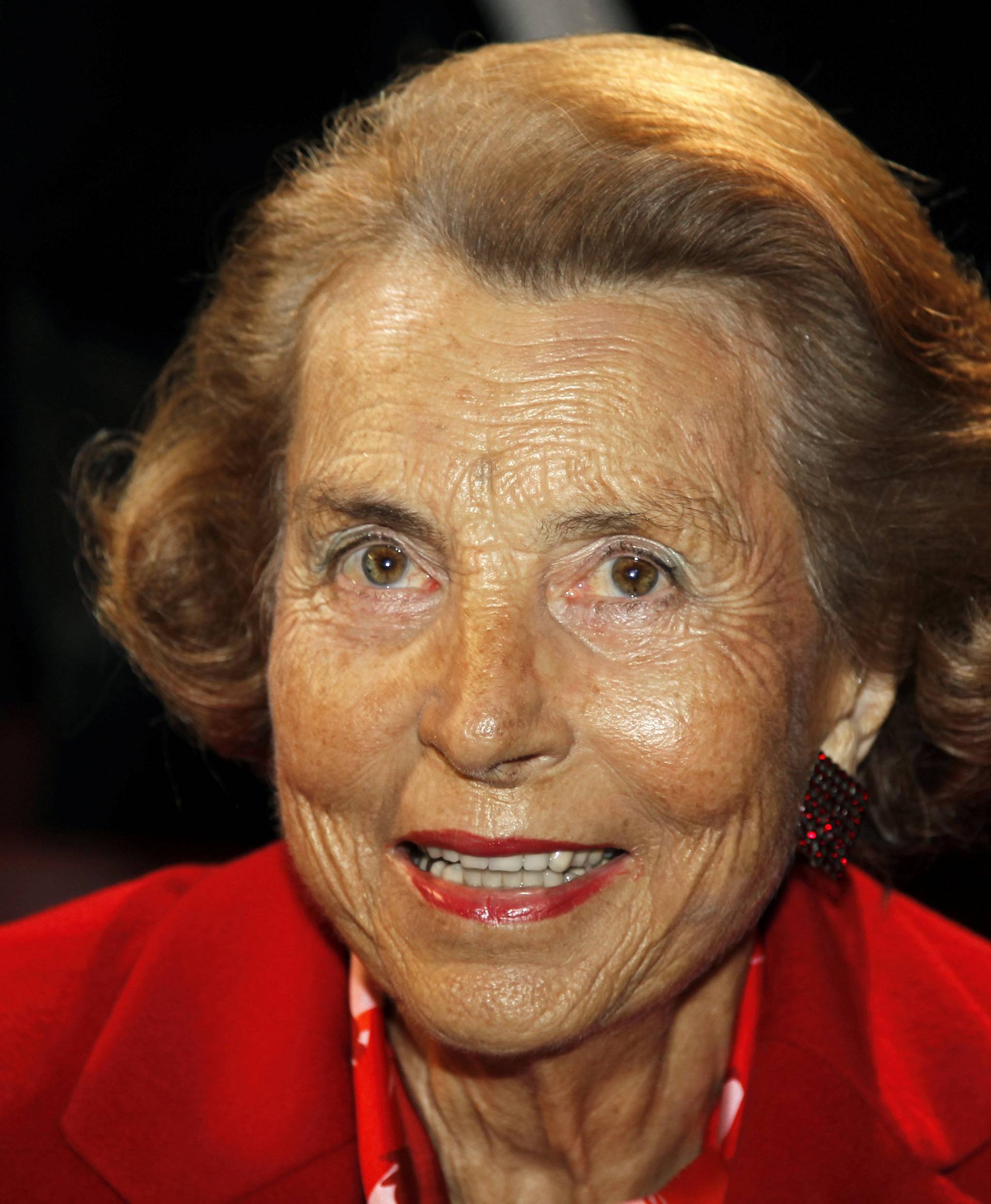FILE PHOTO: Liliane Bettencourt, heiress to the L'Oreal fortune, attends French designer Franck Sorbier's Haute Couture Spring-Summer 2011 fashion show in Paris