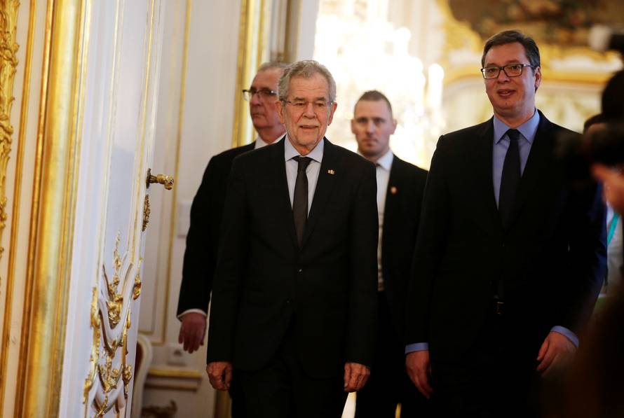 Austria's President Van der Bellen and Serbia's President Vucic arrive at the presidential office in Vienna