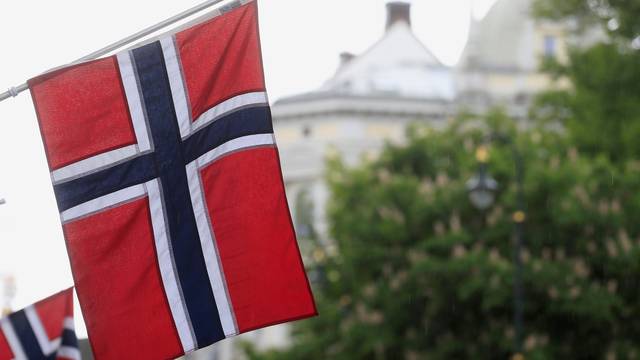 FILE PHOTO: Norwegian flags flutter at Karl Johans street in Oslo