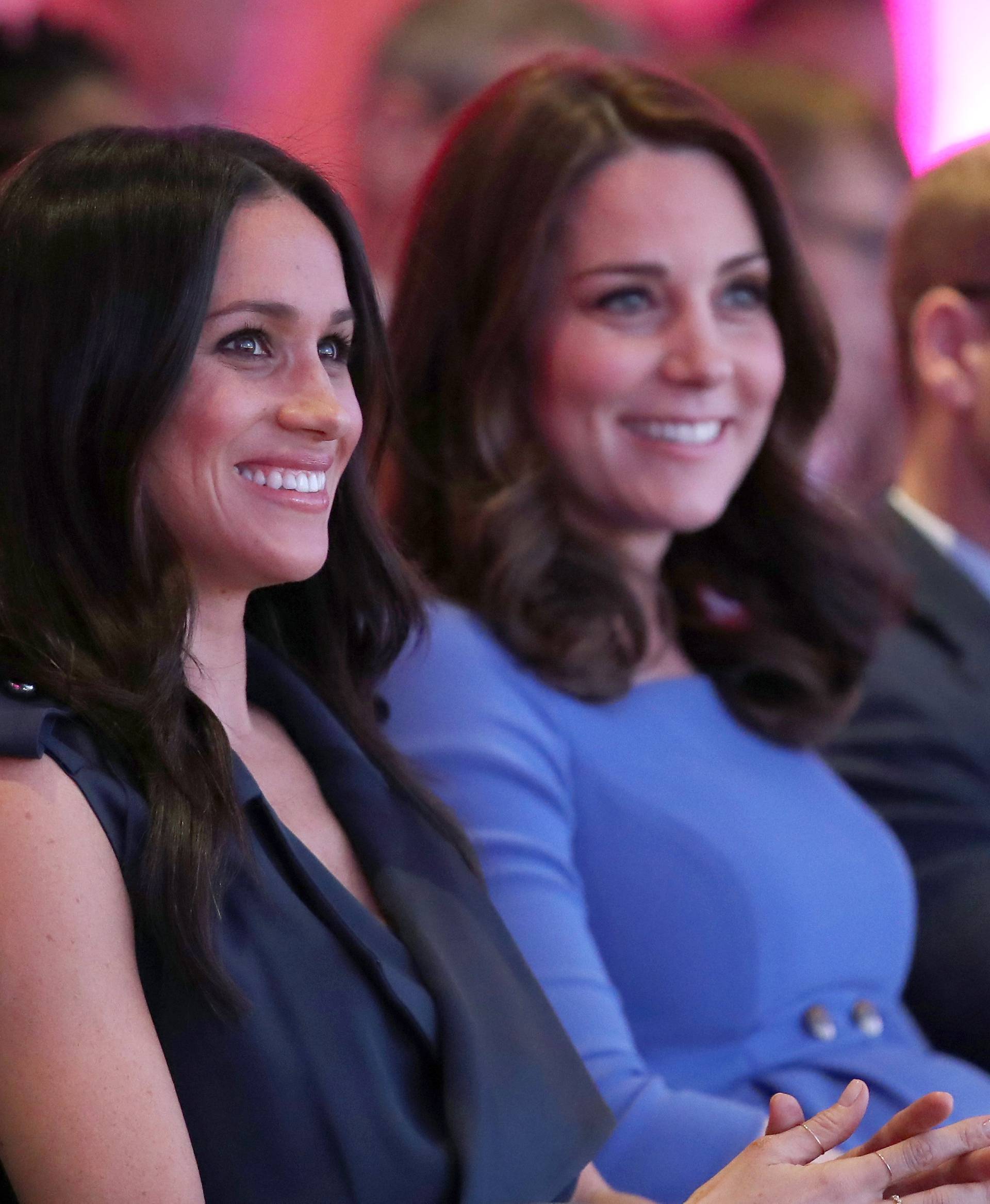 Britain's Prince William, Catherine, Duchess of Cambridge and Prince Harry's fiancee Meghan Markle attend the first annual Royal Foundation Forum held at Aviva in London