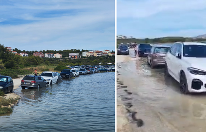 FOTO Turisti parkirali na plažu u Šibeniku, iznenadila ih plima: 'Eto, kad žele prvi red do mora'