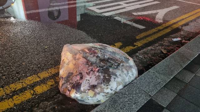 FILE PHOTO: A plastic bag carrying various objects including what appeared to be trash that crossed inter-Korean border with a balloon believed to have been sent by North Korea, is pictured in Seoul