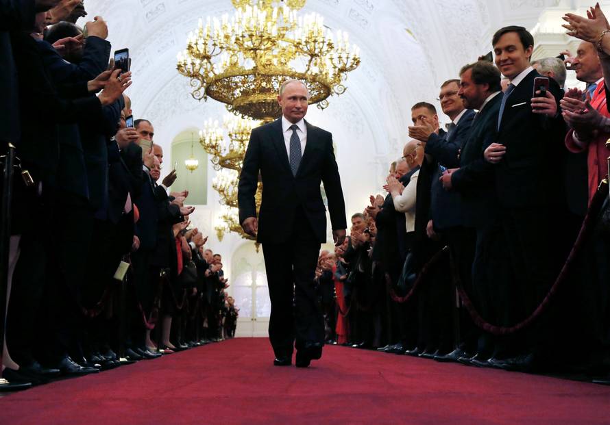 Russian President Putin walks before an inauguration ceremony at the Kremlin in Moscow