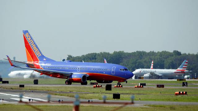 FILE PHOTO: A Southwest Airlines jet taxis on the runway at Washington National Airport in Washington