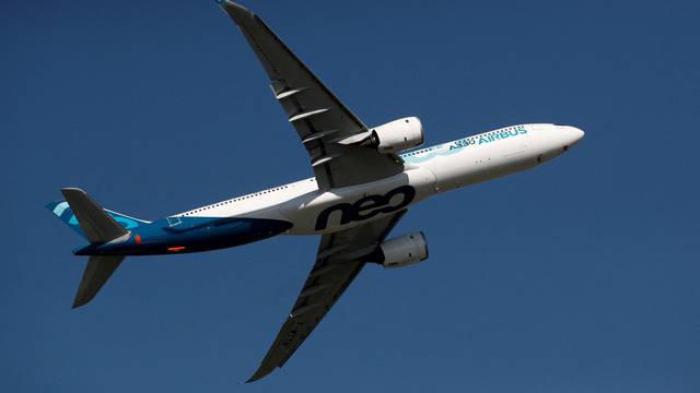 FILE PHOTO: An Airbus A330neo aircraft performs during the inauguration of the 53rd International Paris Air Show at Le Bourget Airport near Paris