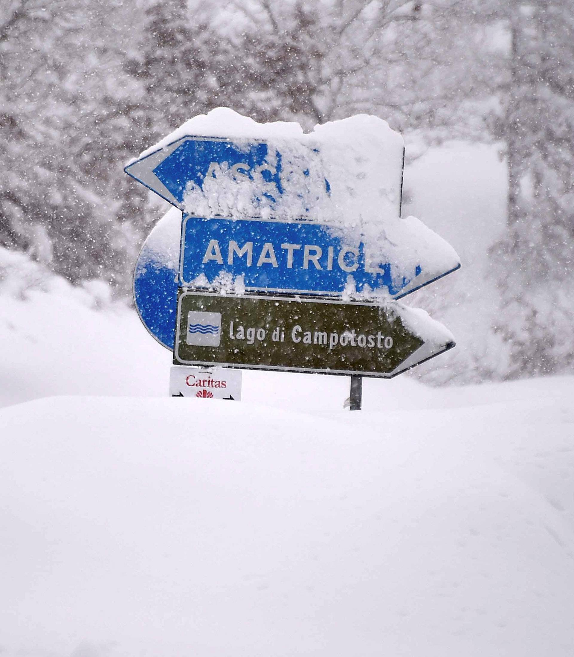 A firefighter car is seen next Amatrice, after a series of earthquakes hit the town and parts of central Italy