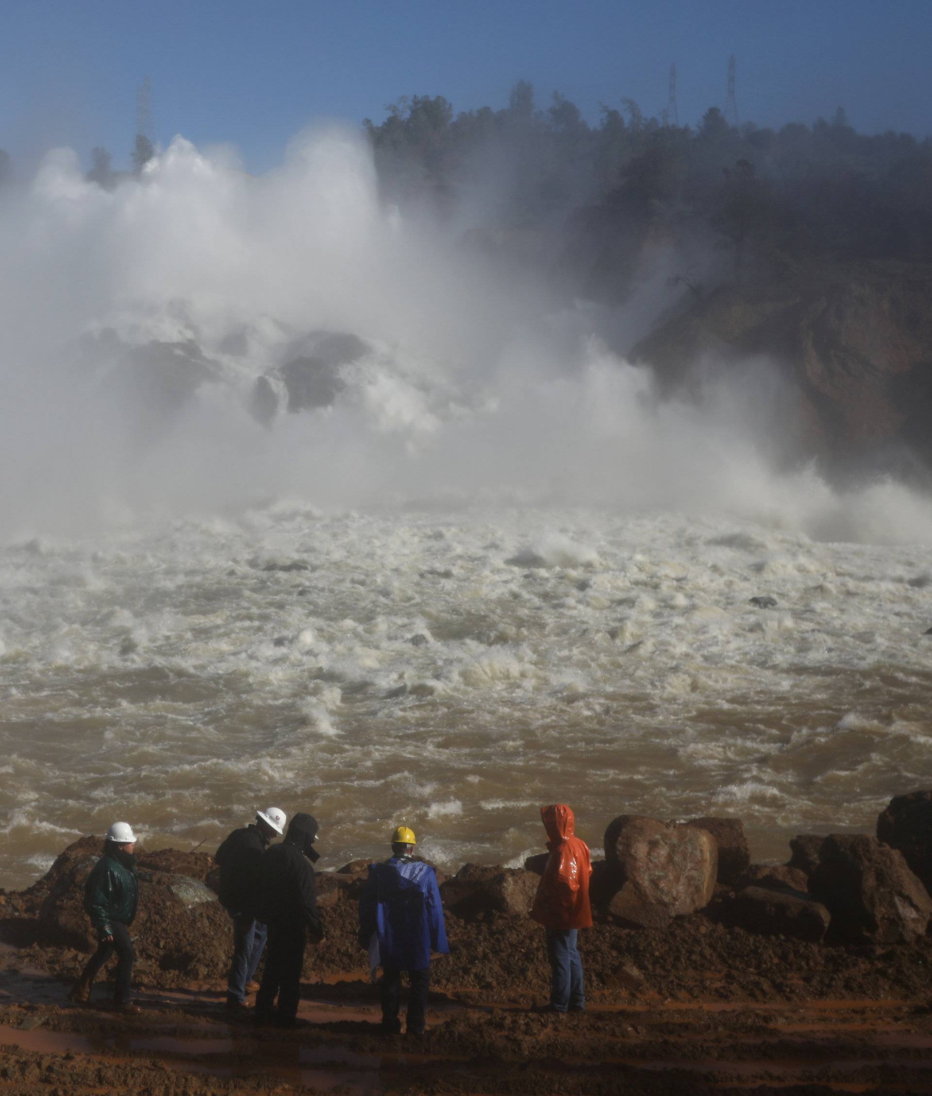 Water is released from the Lake Oroville Dam after an evacuation was ordered for communities downstream from the dam in Oroville