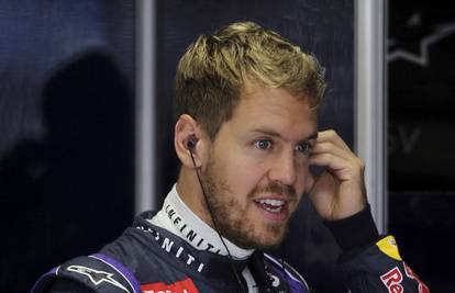 Sebu Vettelu pole position na izrazito kišovitom Interlagosu