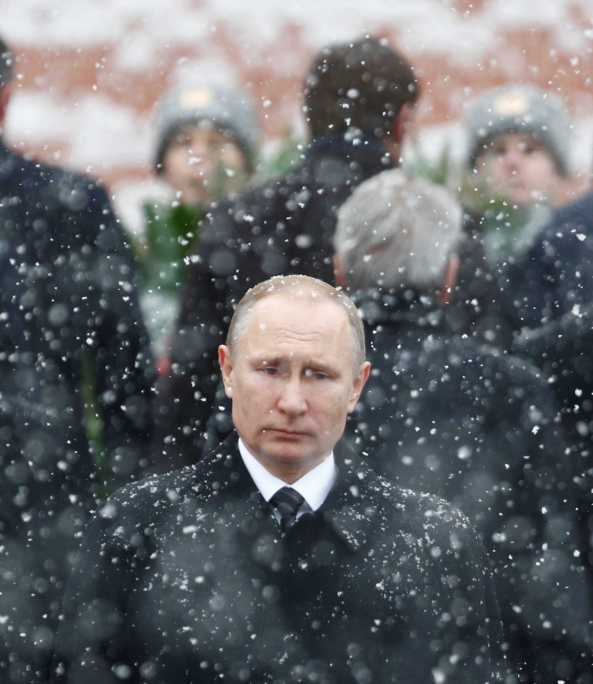 FILE PHOTO: Russian President Putin attends wreath laying ceremony to mark Defender of Fatherland Day at Tomb of Unknown Soldier by Kremlin wall in Moscow