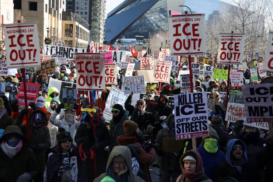 People protest U.S. President Donald Trump's deployment of thousands of immigration enforcement officers on the streets of Minneapolis