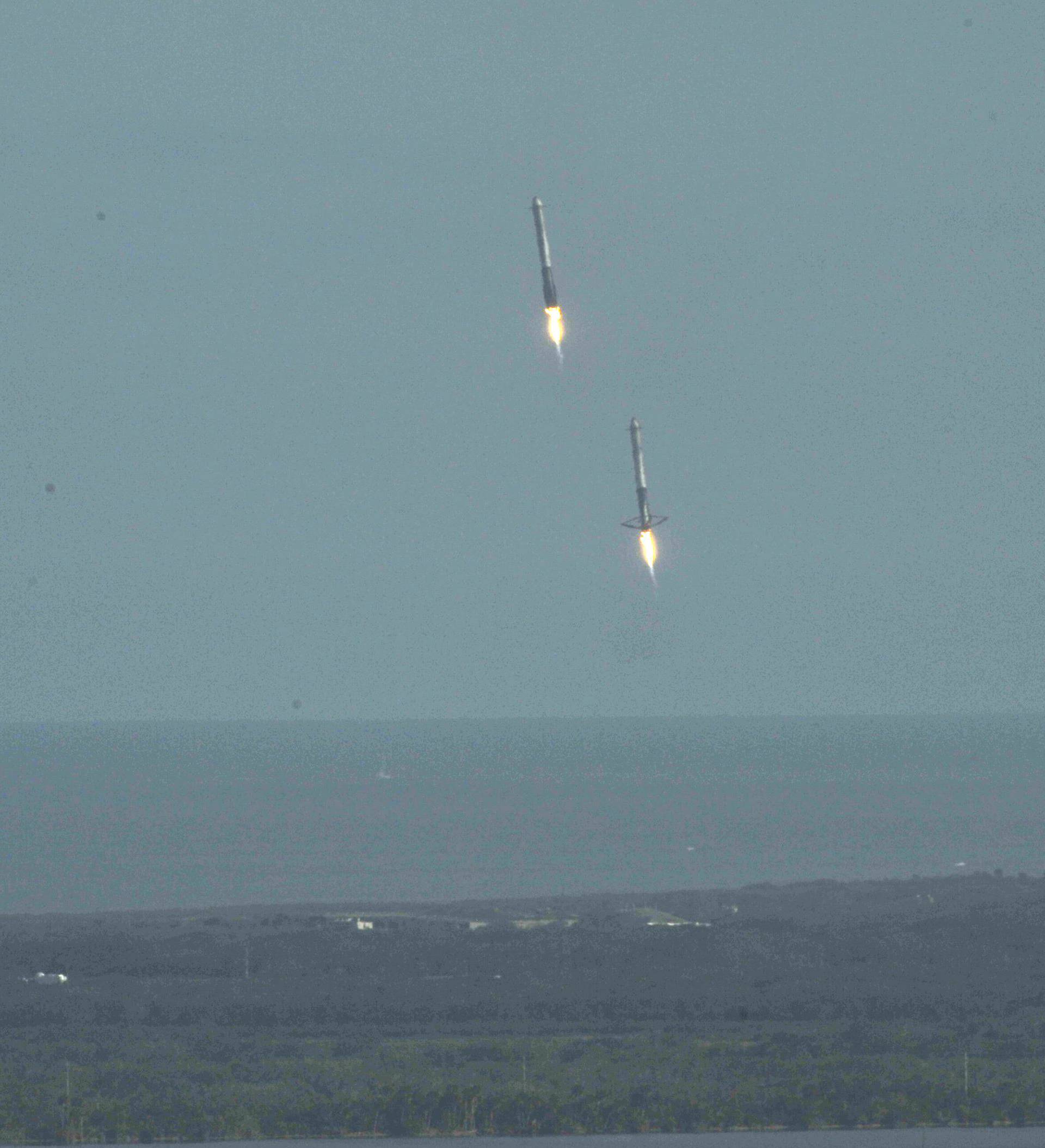 Boosters land after helping launch SpaceX Falcon Heavy rocket from the Kennedy Space Center in Cape Canaveral