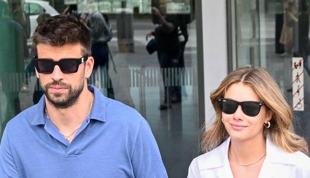 Gerard Pique and Clara Chia brave the media frenzy in Barcelona