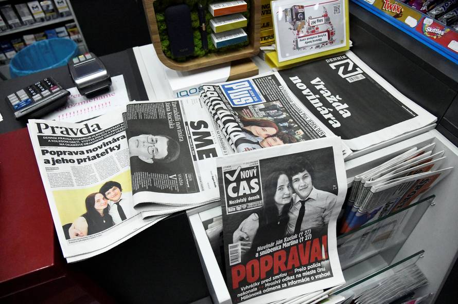 Front pages of Slovak newspapers are seen with headlines about and portraits of murdered Slovak investigative journalist Jan Kuciak and his girlfriend Martina Kusnirova, in a shop in Trnava