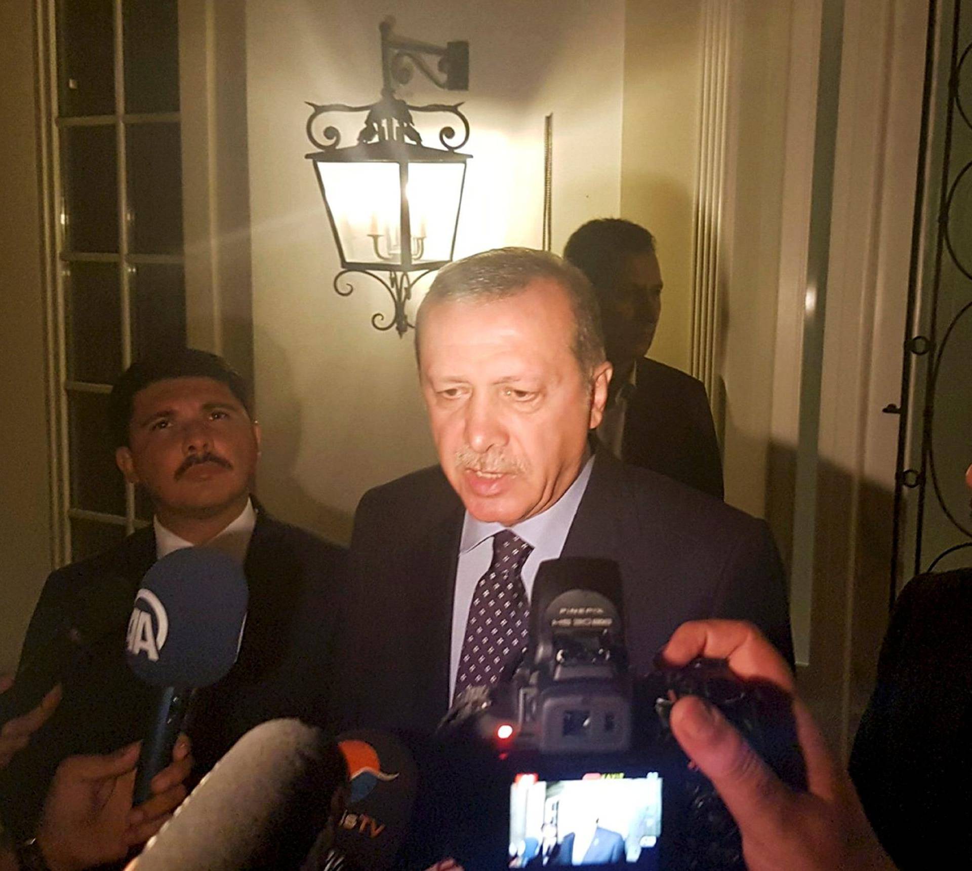 Turkish President Tayyip Erdogan speaks to media in the resort town of Marmaris