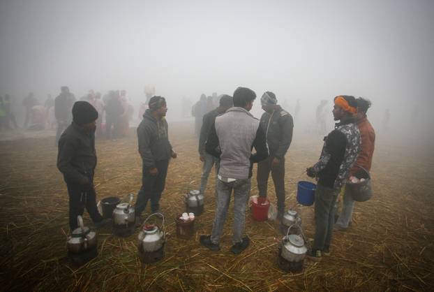 Devotees arrive ahead of Maha Kumbh Mela in Prayagraj