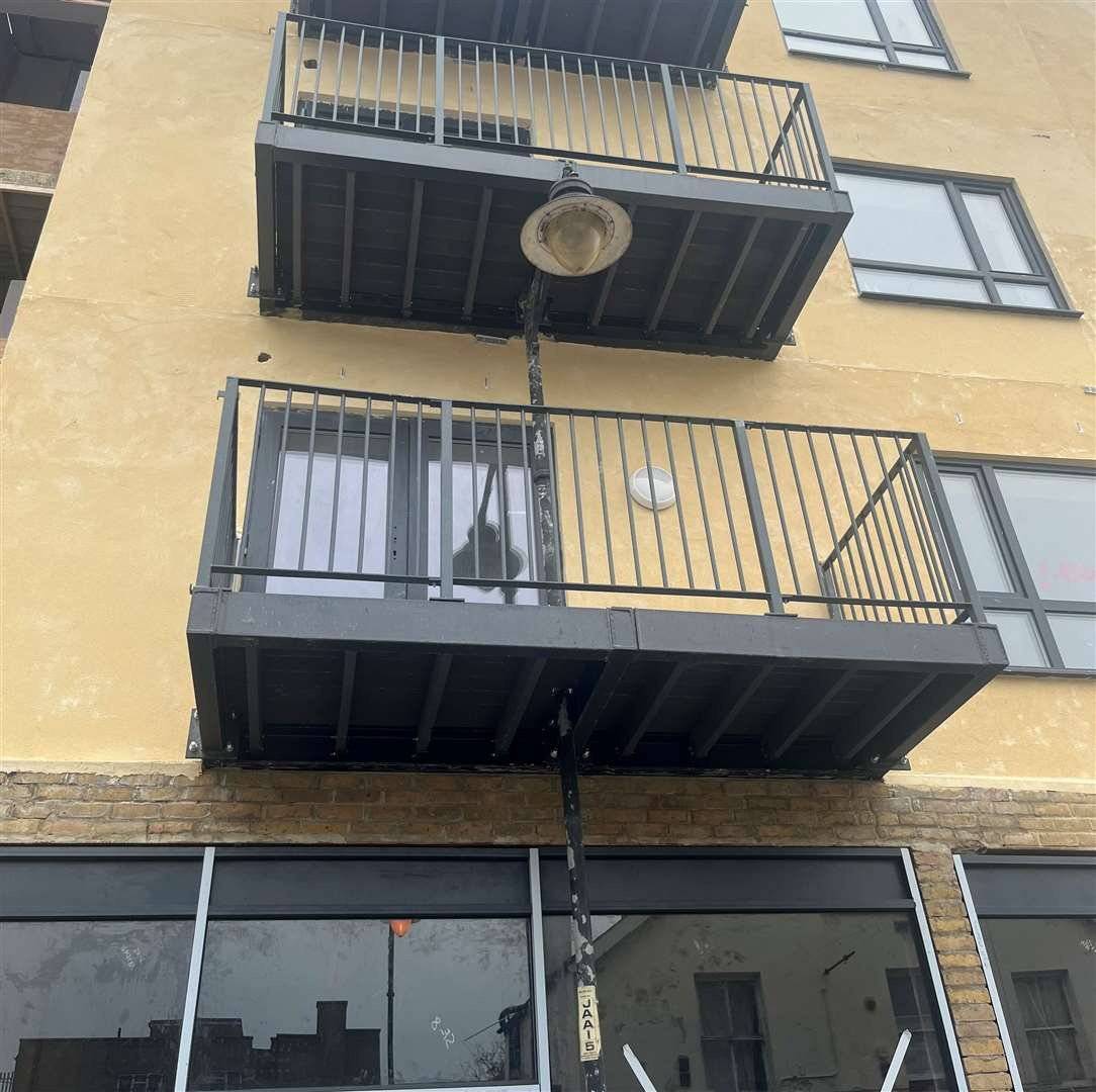 Locals baffled after new-build flat balcony built AROUND lamppost