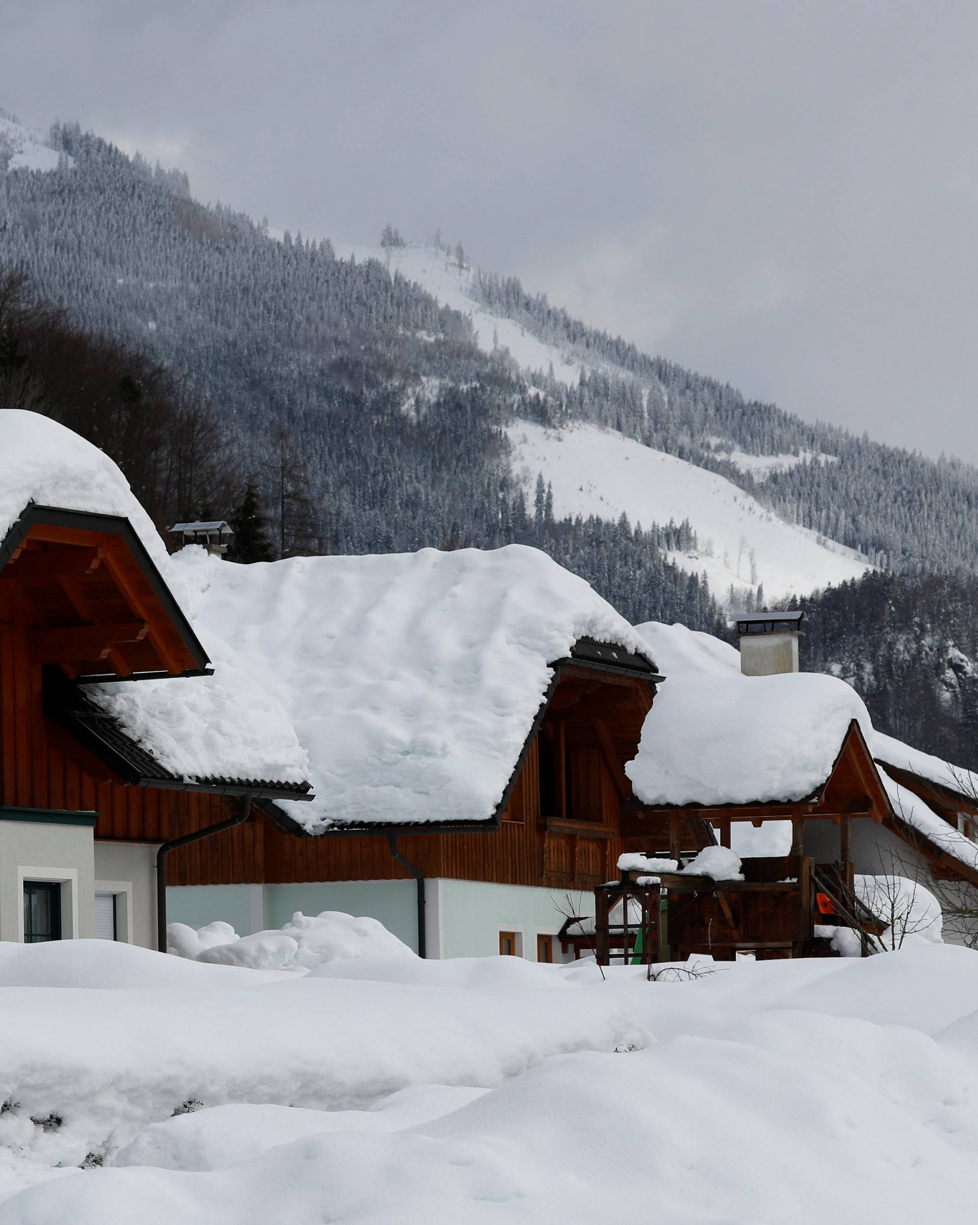 Snow covered houses are seen after heavy snowfall in Rosenau