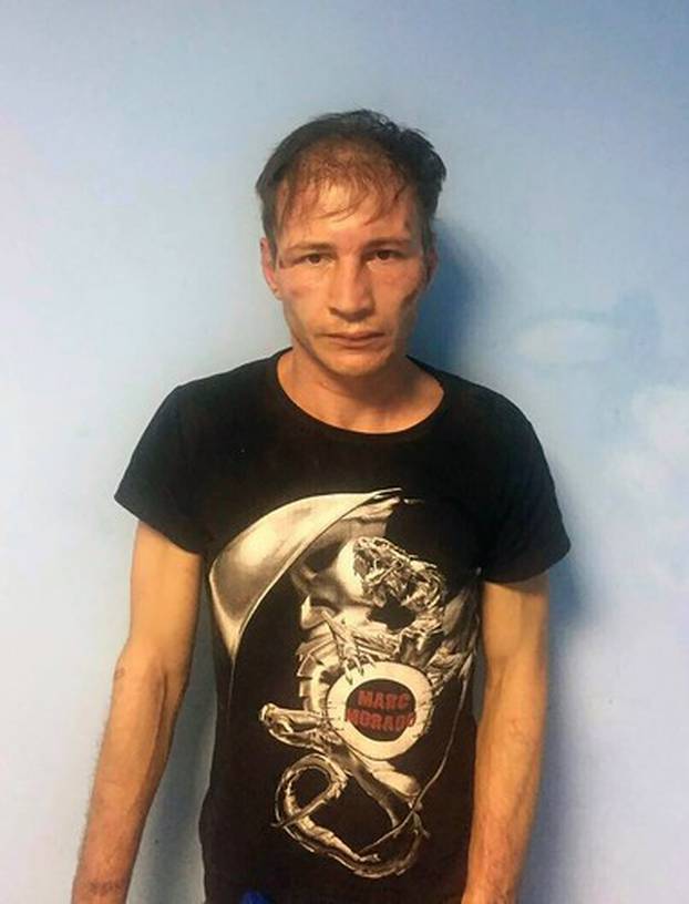 Wife in notorious Russian 'cannibal couple' case is jailed for 11 years for instigating murder of waitress whose butchered corpse was steamed, pickled and frozen