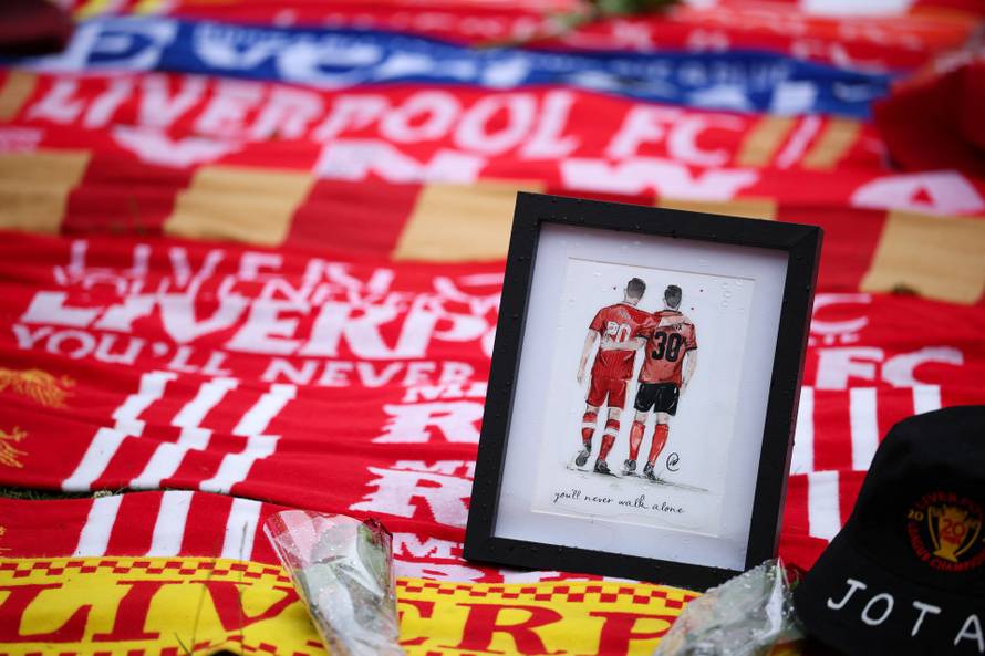 Fans pay their respects to late soccer player Diogo Jota, at Anfield Stadium in Liverpool