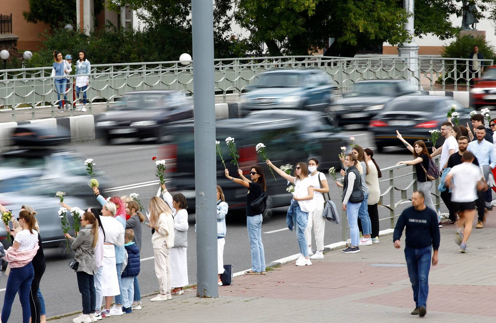 People take part in a demonstration against police violence in Minsk