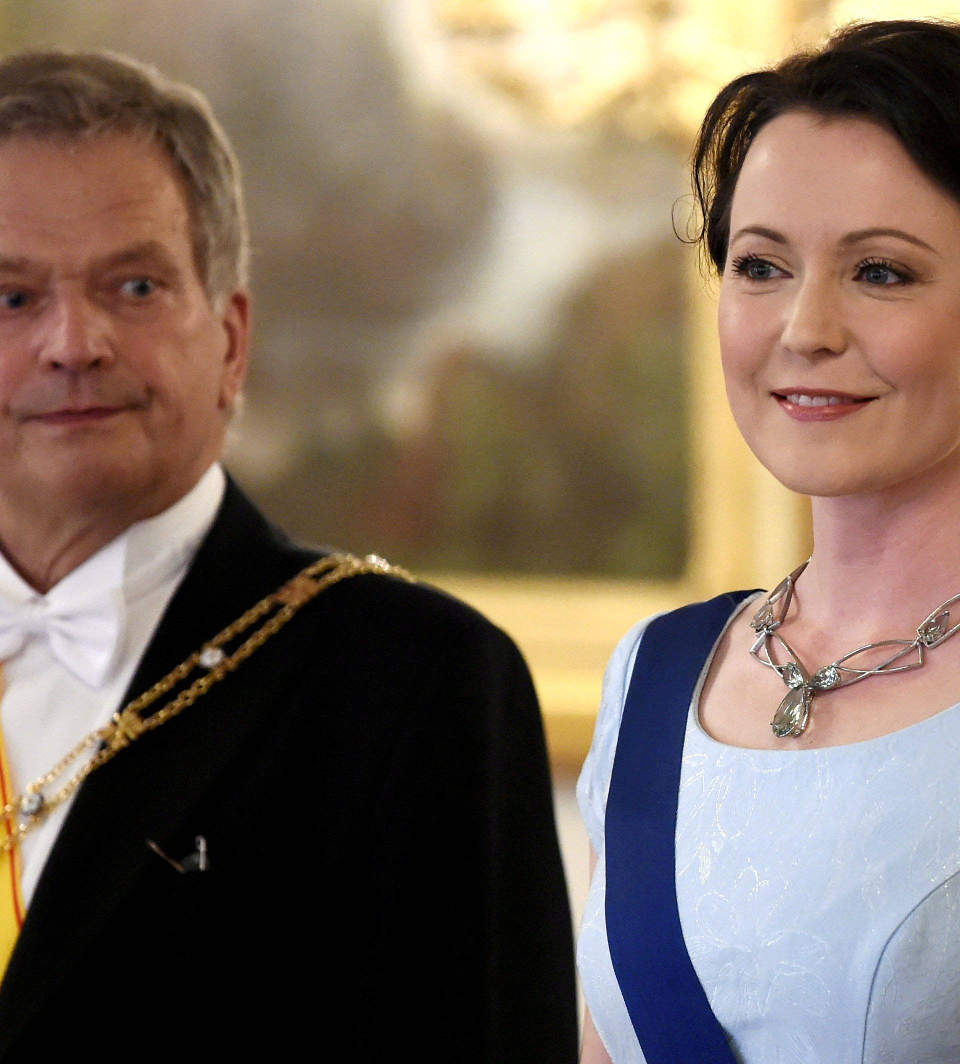 FILE PHOTO: Finland's President Niinisto and his wife Haukio look on before a dinner held at the Presidential Castle in Helsinki