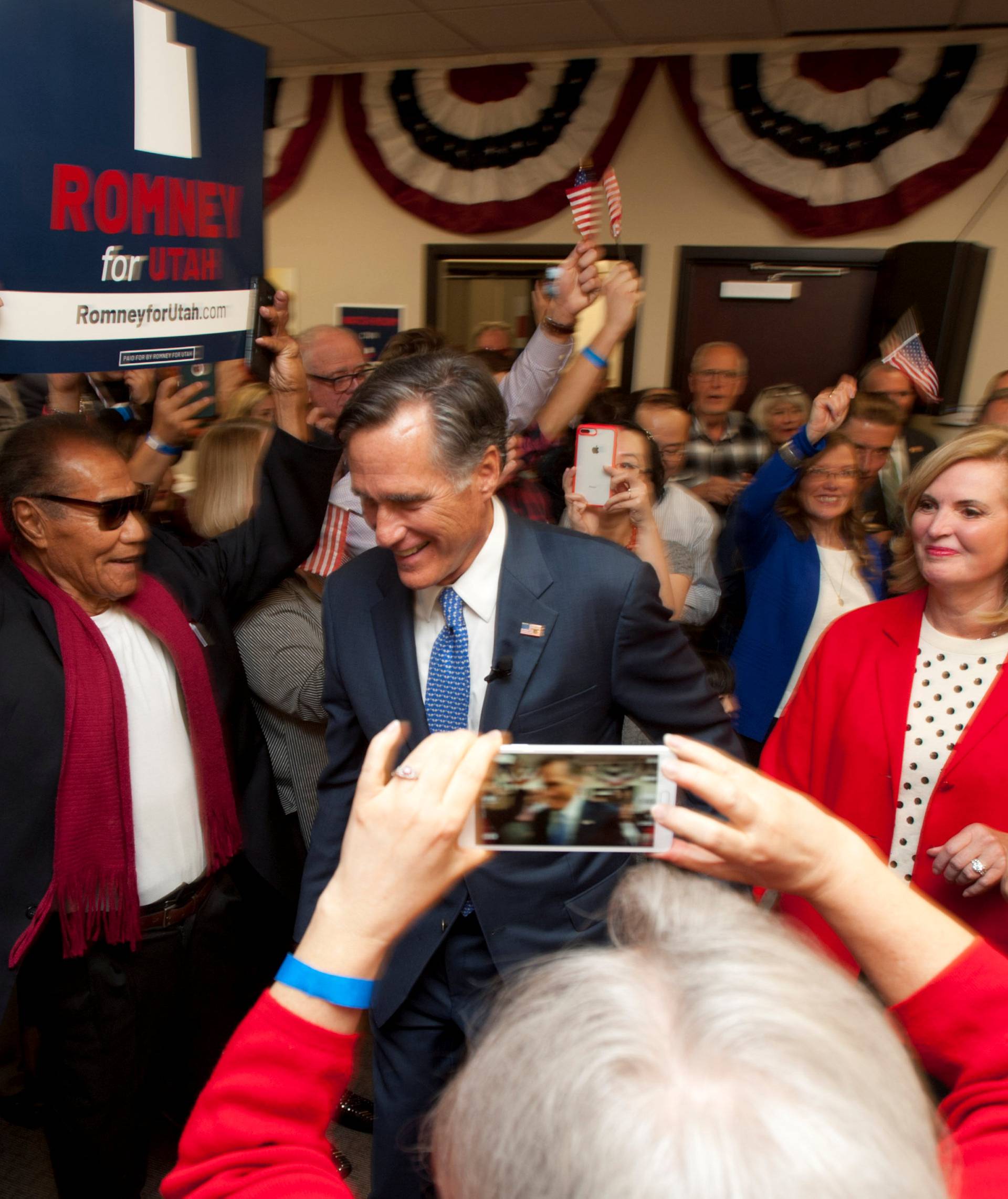 Republican U.S. senate candidate Mitt Romney reacts after appearing at his election night party in Orem