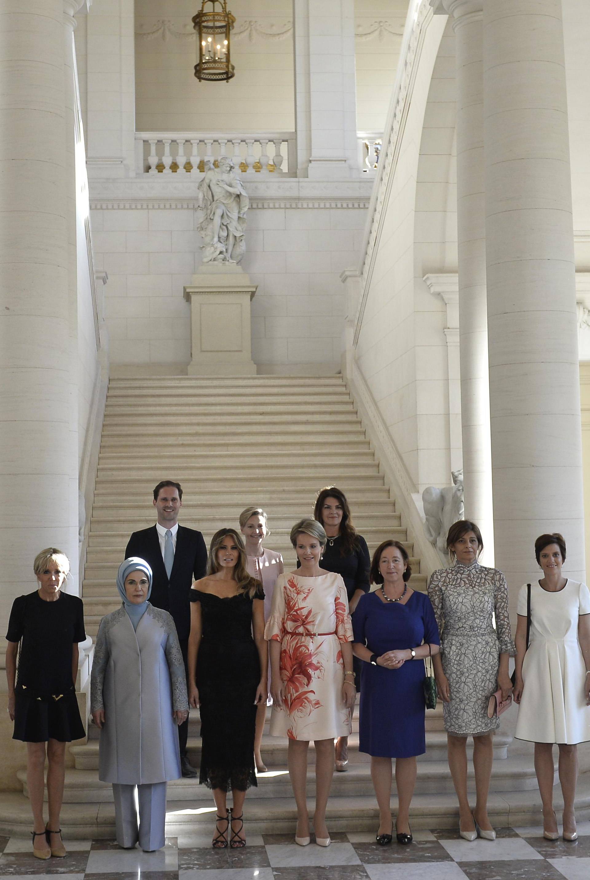 Queen Mathilde of Belgium poses for a group picture at the Royal Castle of Laeken in Brussels