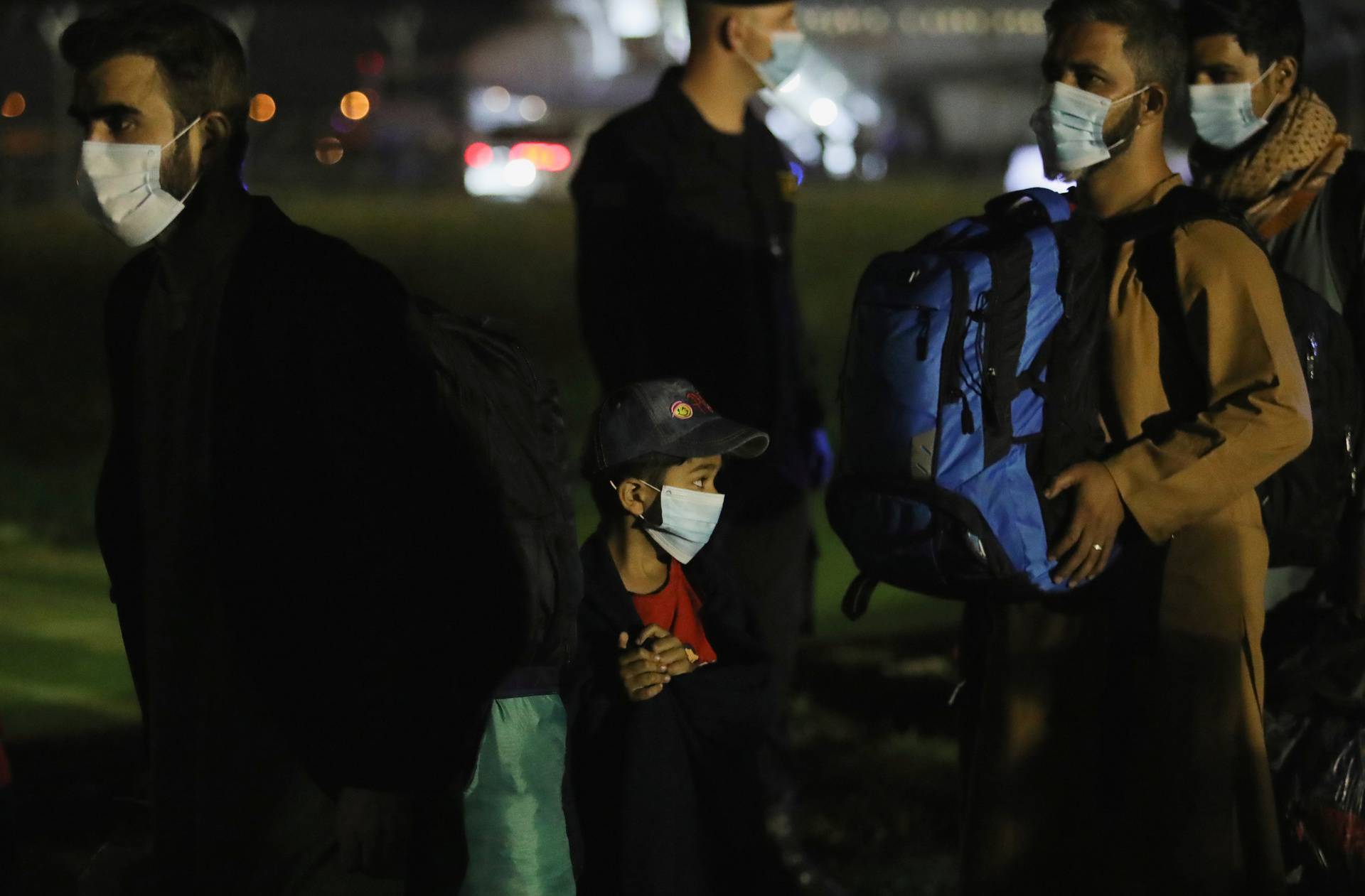 People evacuated from Afghanistan arrive at Tirana International Airport